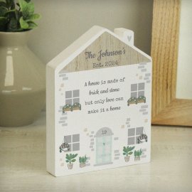 (image for) Personalised Love Makes A Home Wooden House Ornament